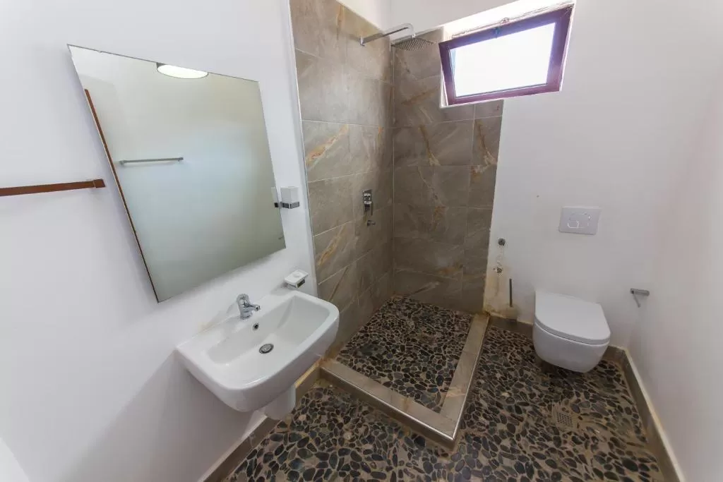 Kolaveri Resort - main bldg DBL room-1.jpg